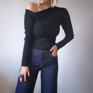 Top “Léonie” – Asymétrique noir lurex, chic et féminin